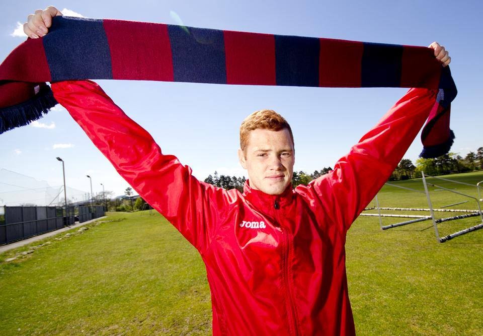 Ryan Thomson with Into the Valley collector`s edition scarf